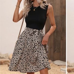 One piece dress, black top with multicolor skirt